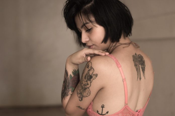 tanning with tattoos
